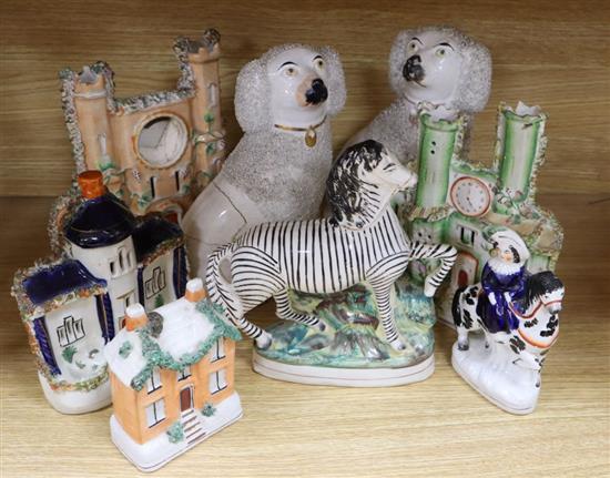 Eight pieces of Staffordshire pottery, dogs 25cm